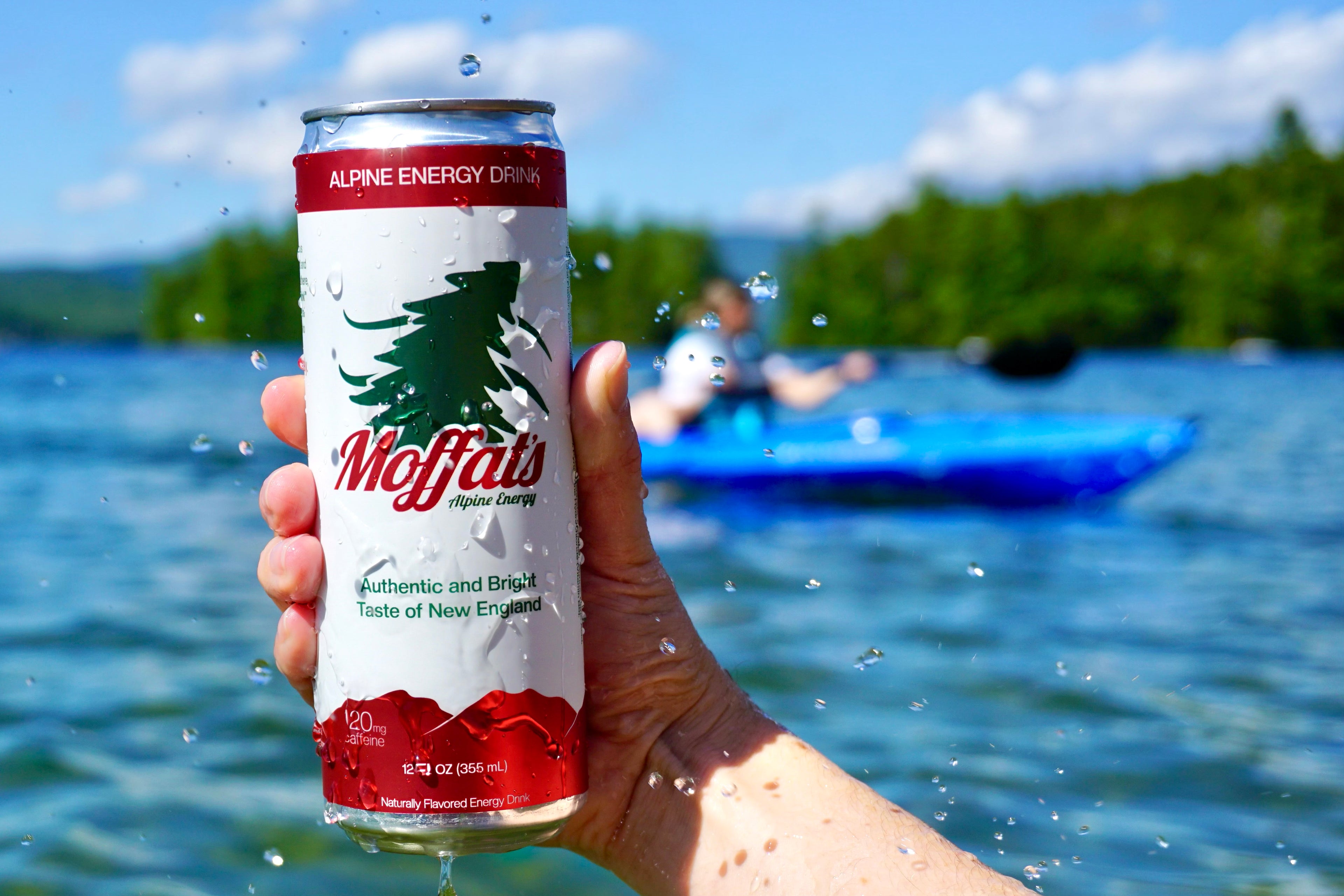 Kayaking on the lake drinking a Moffat's Alpine Energy Drink